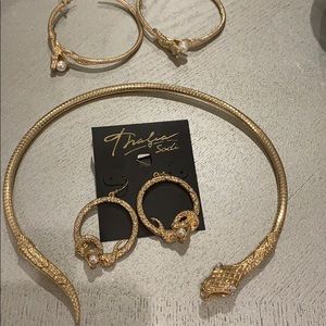 Thalia snake necklace and earring set.